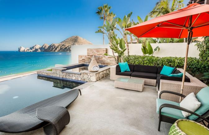 Cabana Chairs and pool overlooking the water