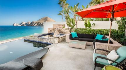 Cabana Chairs and pool overlooking the water